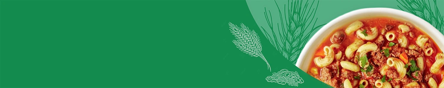 Pasta dish with greens on a green background